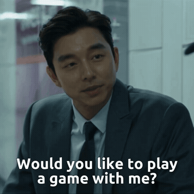 A Man In A Suit And Tie Is Asking If He Would Like To Play A Game With Him GIF