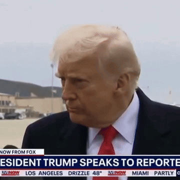 A Man In A Suit And Tie Is Being Interviewed On Fox News GIF