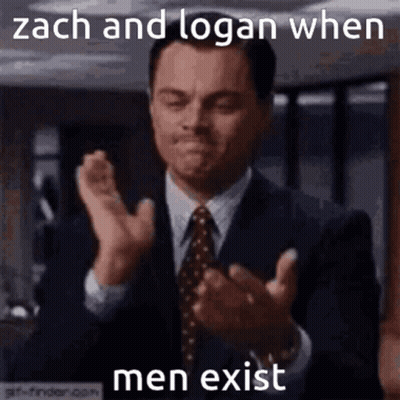 A Man In A Suit And Tie Is Clapping His Hands And Says Zach And Logan When Men Exist GIF