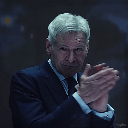 Man In Suit Clapping With Kepler Text GIF