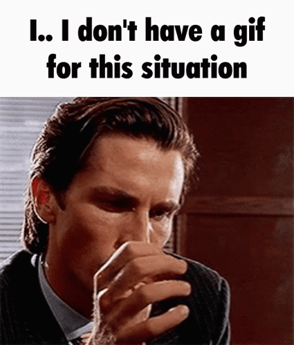 A Man In A Suit And Tie Is Covering His Nose With His Hand .. GIF