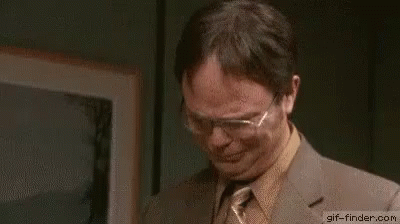 A Man In A Suit And Tie Is Crying While Saying `` Thank You '' . GIF
