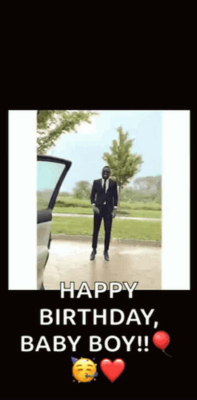 A Man In A Suit And Tie Is Dancing In Front Of A Car With The Words Happy Birthday Baby Boy GIF