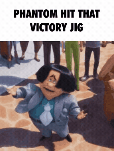 A Man In A Suit And Tie Is Dancing In Front Of A Crowd And Says Phantom Hit That Victory Jig GIF