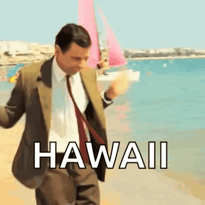 A Man In A Suit And Tie Is Dancing On A Beach With The Word Hawaii Written On The Bottom GIF