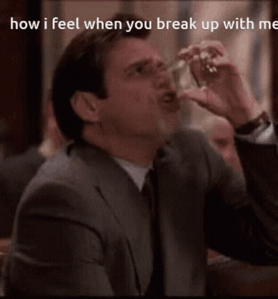 A Man In A Suit And Tie Is Drinking From A Glass With The Caption How I Feel When You Break Up With Me . GIF