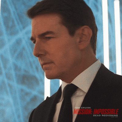 A Man In A Suit And Tie Is Featured On A Poster For Mission Impossible GIF