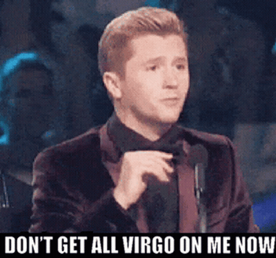 A Man In A Suit And Tie Is Giving A Speech And Says " Do N't Get All Virgo On Me Now " GIF
