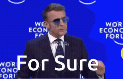 A Man In A Suit And Tie Is Giving A Speech And The Words For Sure Are On The Screen Behind Him GIF