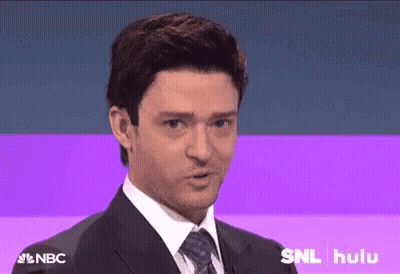 A Man In A Suit And Tie Is Giving A Speech On Nbc . GIF