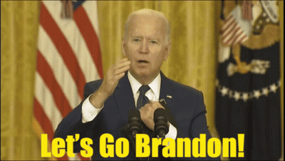A Man In A Suit And Tie Is Giving A Speech With The Words Let 'S Go Brandon On The Bottom GIF