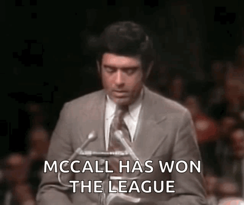 A Man In A Suit And Tie Is Giving A Speech With The Words Mccall Has Won The League GIF