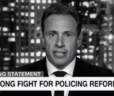 A Man In A Suit And Tie Is Giving A Statement About A Long Fight For Police Reform GIF