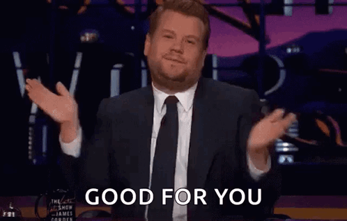 A Man In A Suit And Tie Is Giving A Thumbs Up And Says `` Good For You '' . GIF