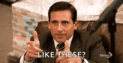 A Man In A Suit And Tie Is Giving A Thumbs Up And Says Like These . GIF