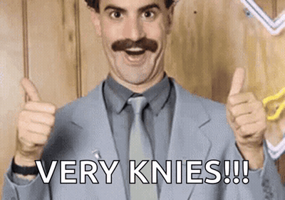 A Man In A Suit And Tie Is Giving A Thumbs Up With The Words Very Knees Written Below Him . GIF