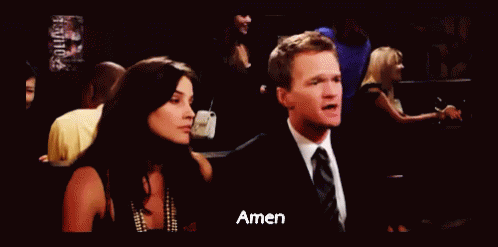 a man in a suit and tie is giving a woman a high five and the word amen is on the bottom right