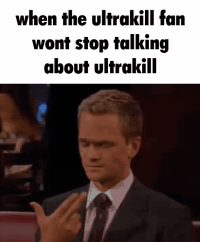 A Man In A Suit And Tie Is Giving The Middle Finger To Someone . GIF