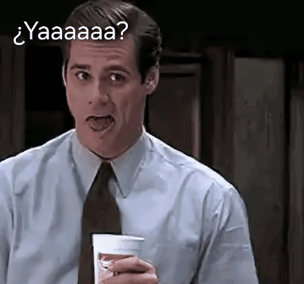 A Man In A Suit And Tie Is Holding A Cup Of Coffee And Making A Funny Face With The Word Yaaaa Written Above Him GIF