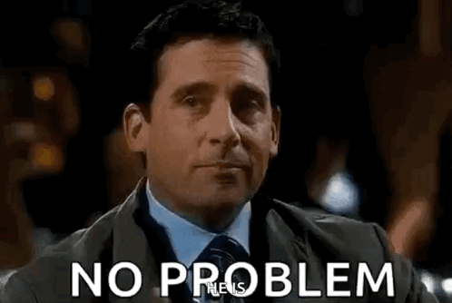 A Man In A Suit And Tie Is Holding A Glass Of Whiskey And Says `` No Problem '' . GIF