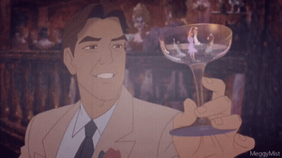 A Man In A Suit And Tie Is Holding A Glass With A Picture Of A Woman In It GIF