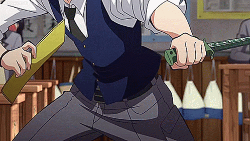 A Man In A Suit And Tie Is Holding A Knife And A Piece Of Paper . GIF
