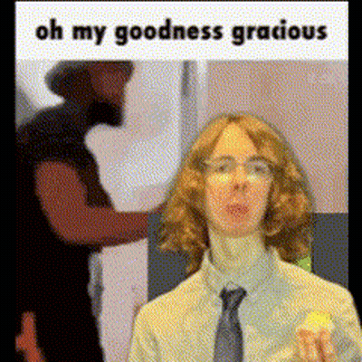 A Man In A Suit And Tie Is Holding A Lemon With The Words Oh My Goodness Gracious Written Above Him GIF