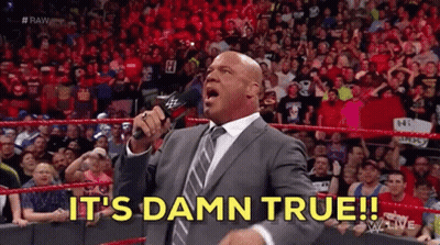 A Man In A Suit And Tie Is Holding A Microphone And Saying It 'S Damn True ! GIF