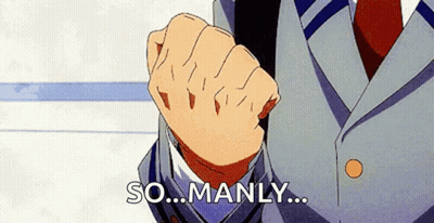 A Man In A Suit And Tie Is Holding His Fist Up In The Air And Saying `` So ... Manly ... '' . GIF