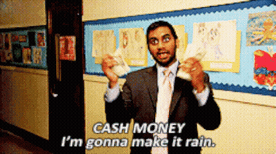 A Man In A Suit And Tie Is Holding Money And Saying Cash Money I 'M Gonna Make It Rain . GIF