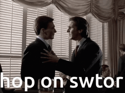 A Man In A Suit And Tie Is Hugging Another Man With The Words Hop On Swtor Below Them GIF