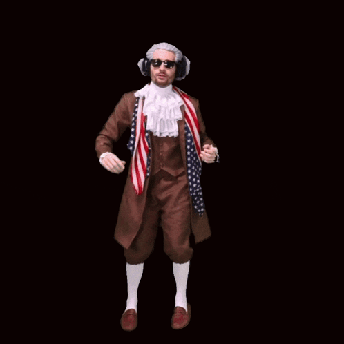 A Man In A Suit And Tie Is Jumping In The Air With The Word Joke Above Him GIF