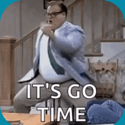 A Man In A Suit And Tie Is Jumping In The Air With The Words It 'S Go Time Written Below Him GIF