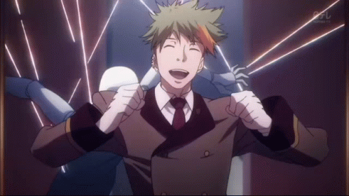 A Man In A Suit And Tie Is Laughing In Front Of A Sign That Says ' Tbs ' On It GIF