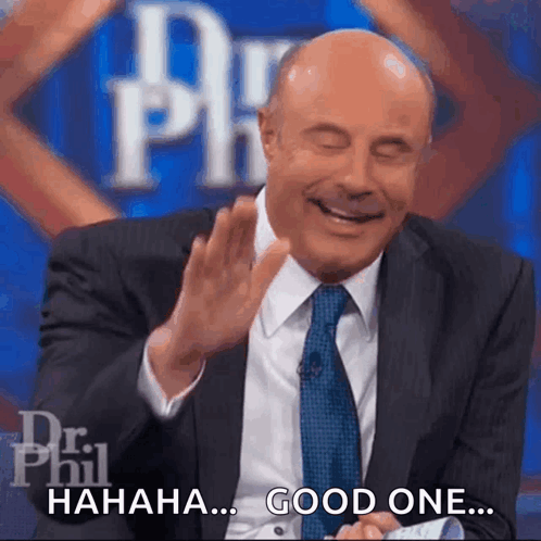 A Man In A Suit And Tie Is Laughing With The Words " Good One " Next To Him GIF