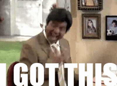 A Man In A Suit And Tie Is Laughing With The Words " I Got This " Above Him GIF