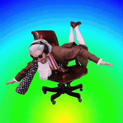 A Man In A Suit And Tie Is Laying On A Chair With His Feet Up GIF