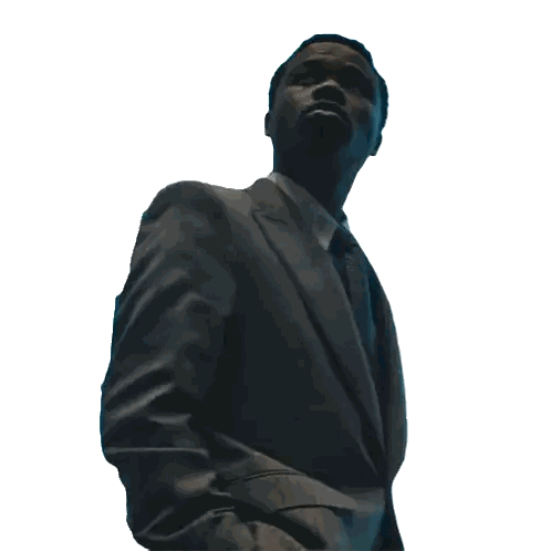A Man In A Suit And Tie Is Looking Up At Something Sticker