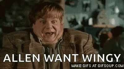 A Man In A Suit And Tie Is Making A Funny Face And Saying `` Allen Want Wings '' . GIF