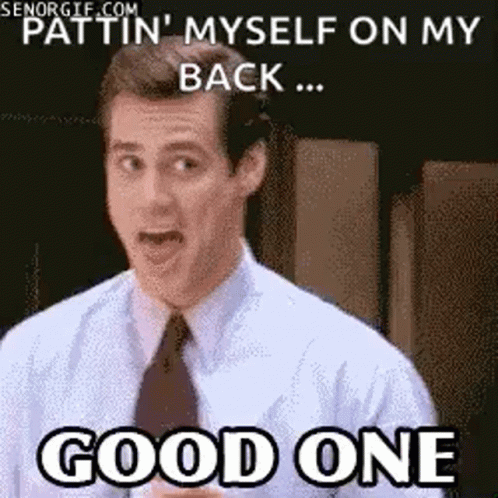 A Man In A Suit And Tie Is Making A Funny Face And Saying Good One . GIF