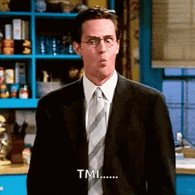A Man In A Suit And Tie Is Making A Funny Face And Saying `` Tmi ... '' . GIF