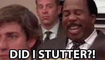 A Man In A Suit And Tie Is Making A Funny Face And Says `` Did I Stutter ? '' GIF