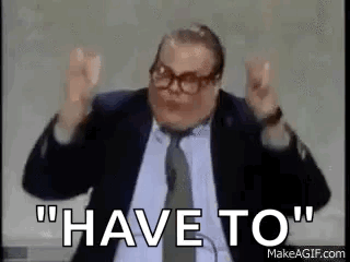 A Man In A Suit And Tie Is Making A Funny Face And Says `` Have To '' . GIF