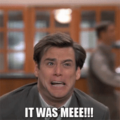 A Man In A Suit And Tie Is Making A Funny Face And Says It Was Meee !!! GIF