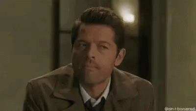 A Man In A Suit And Tie Is Making A Funny Face And Says `` Maybe '' . GIF