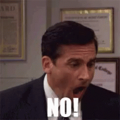 Man In Suit Making Funny Face Saying No GIF