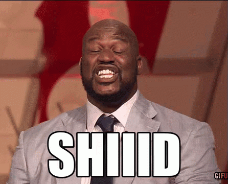 A Man In A Suit And Tie Is Making A Funny Face And Says Shiid GIF