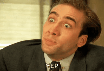 A Man In A Suit And Tie Is Making A Funny Face And Says Yep GIF