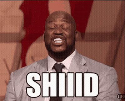 A Man In A Suit And Tie Is Making A Funny Face And The Word Shiiid Is Above Him . GIF