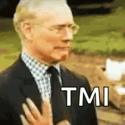 A Man In A Suit And Tie Is Making A Funny Face While Holding His Hand To His Chest . GIF